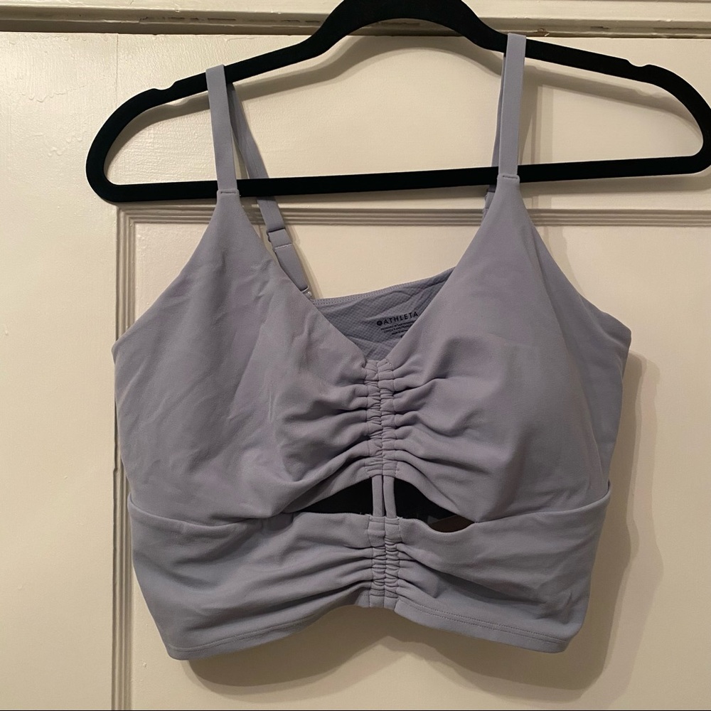 Athleta cropped light blue tank. Pads included size Large.